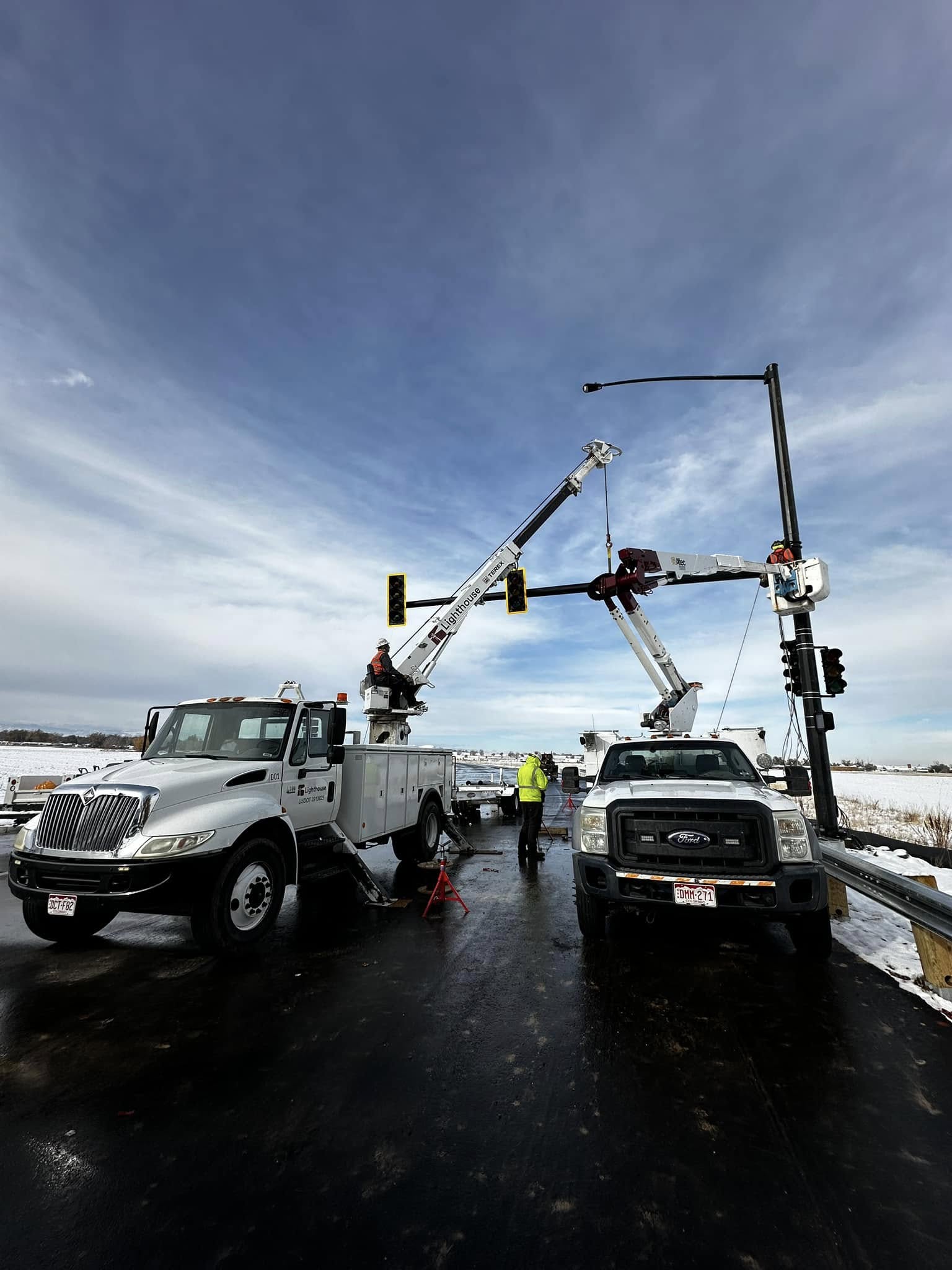 Crews installing traffic signal installation in Cherry Hills Village, CO