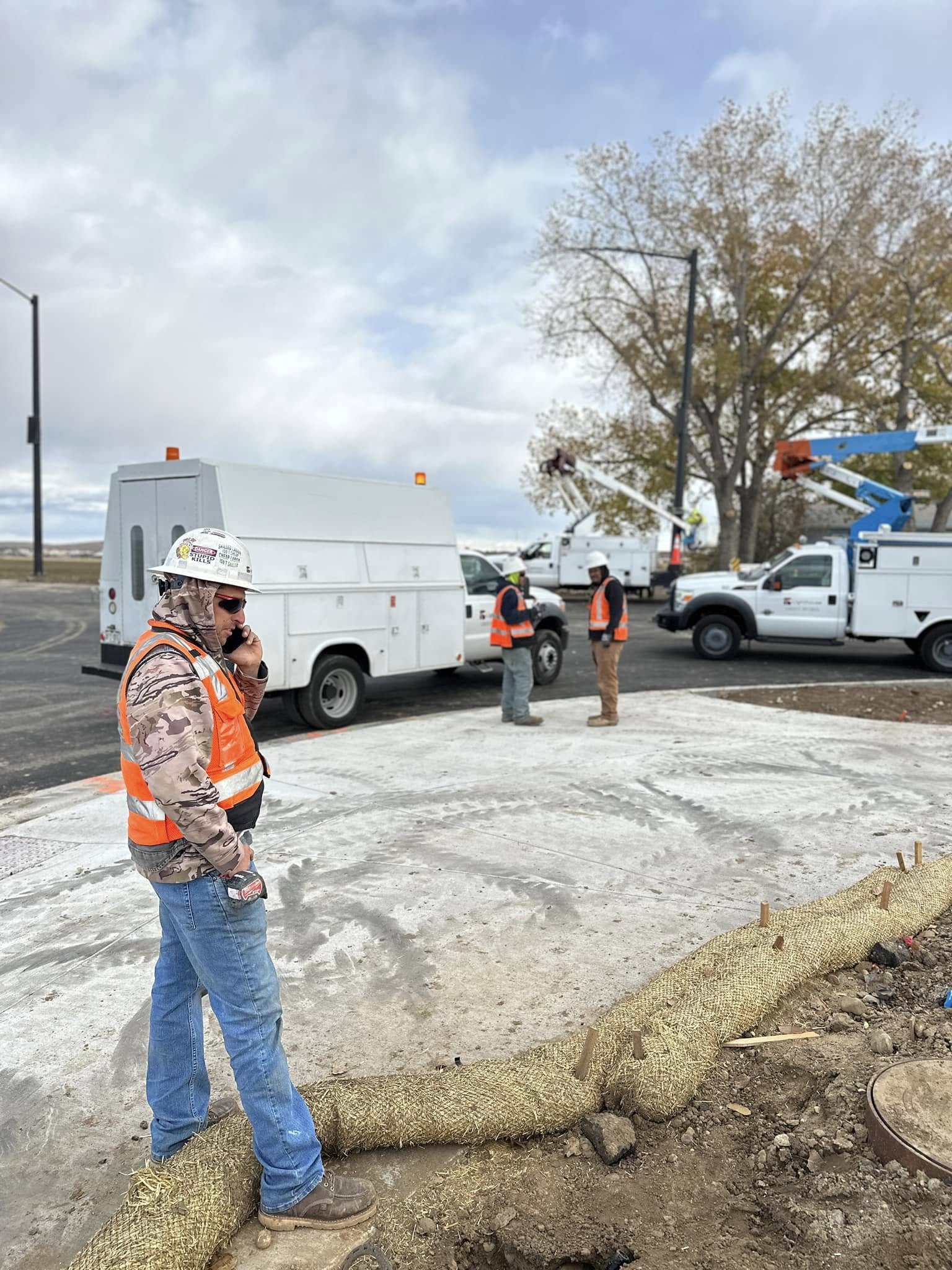 Technicians completing traffic signal installation in Centennial, CO